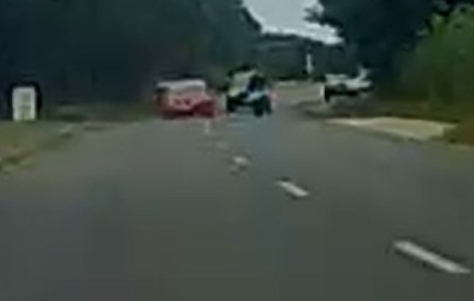 Car overtaking bike 2.jpg